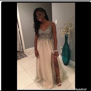 I’m selling a long backless dress with a split